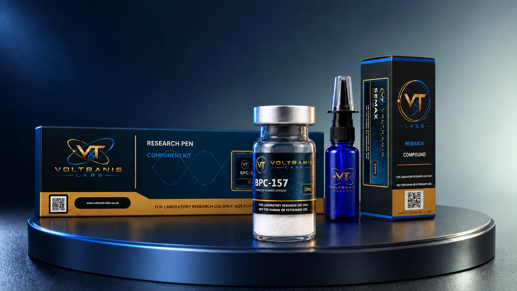 The Voltranis Labs range on a dark plinth: a boxed research pen component kit, a labelled BPC-157 vial, a nasal spray and a compound carton.