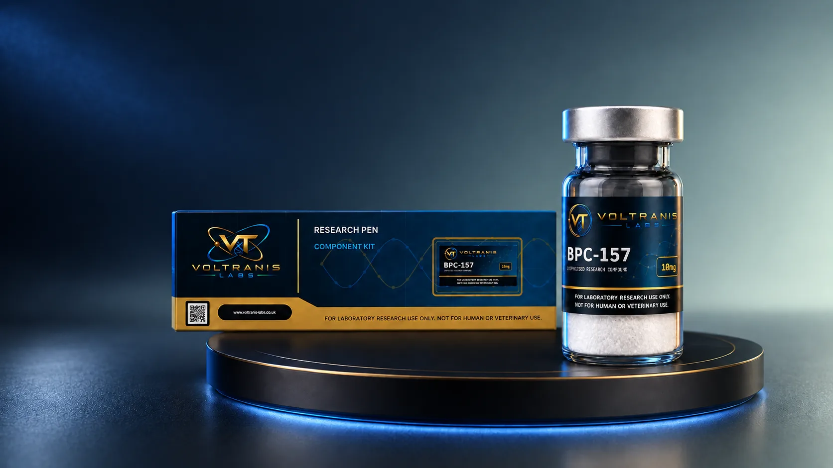 A boxed Voltranis Labs research pen component kit beside a labelled BPC-157 vial on a dark plinth.