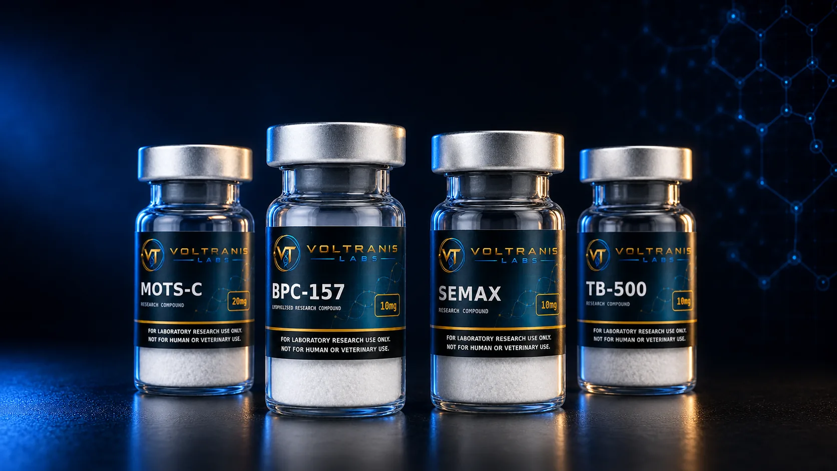 Four labelled Voltranis Labs research vials in a row against a dark studio ground: MOTS-C, BPC-157, Semax and TB-500.