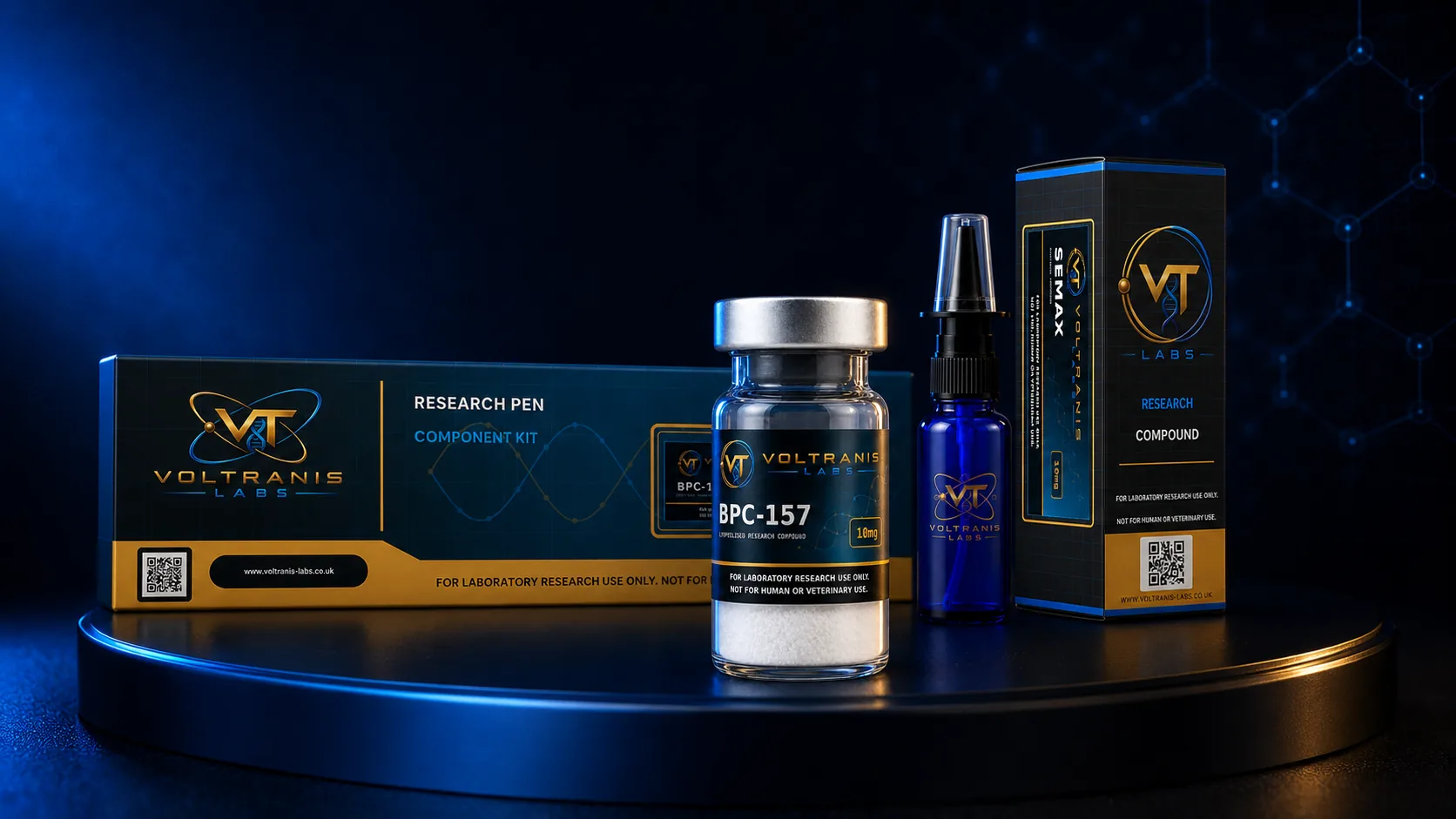 The Voltranis Labs range on a dark plinth: a boxed research pen component kit, a labelled BPC-157 vial, a nasal spray and a compound carton.