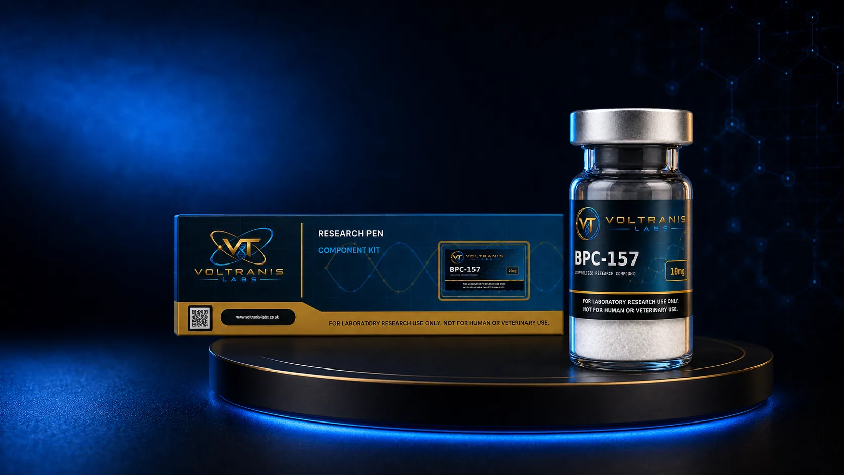 A boxed Voltranis Labs research pen component kit beside a labelled BPC-157 vial on a dark plinth.